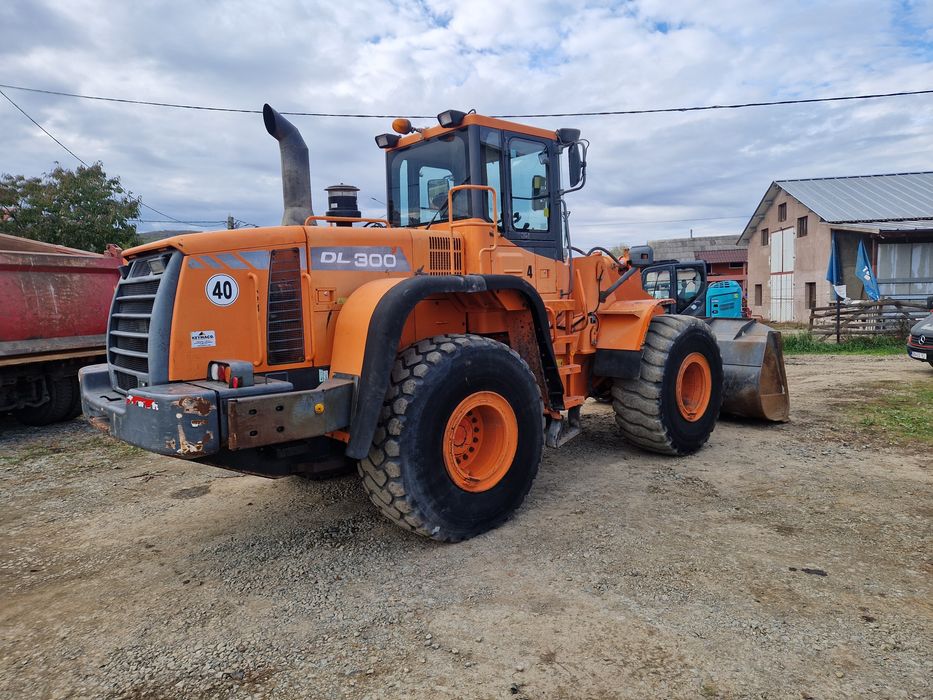 Încărcător frontal, Vola