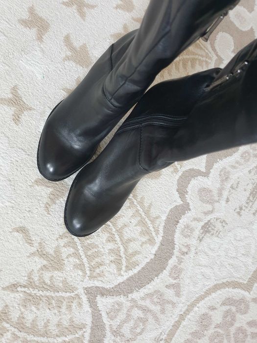 Женские сапоги-ботфорты