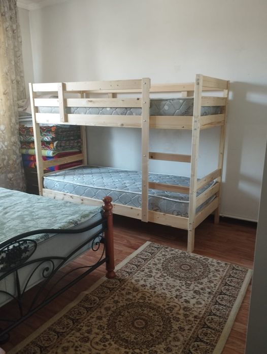 Кровать екі этажды