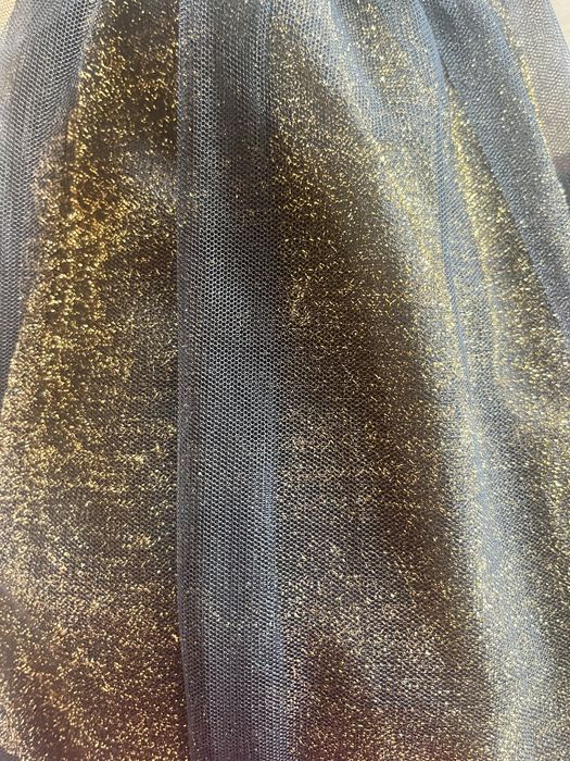 Черна пола до коляното с лъскава подплата