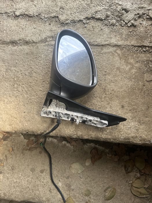 Plansa bord ,oglinda st dr VW Golf 5 Plus