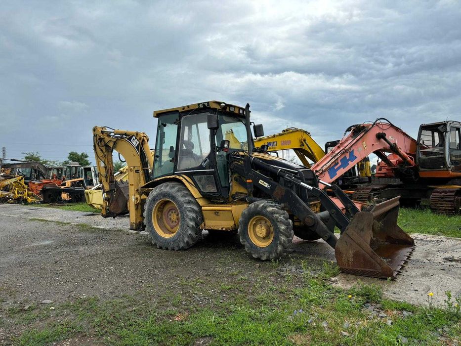 Dezmembrez buldoexcavator Caterpillar 428D-piese de schimb Caterpillar