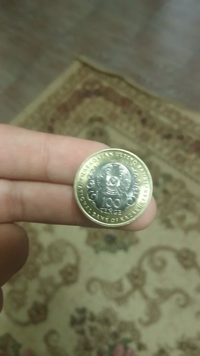 30 жылдык 100 тенгелік монета
