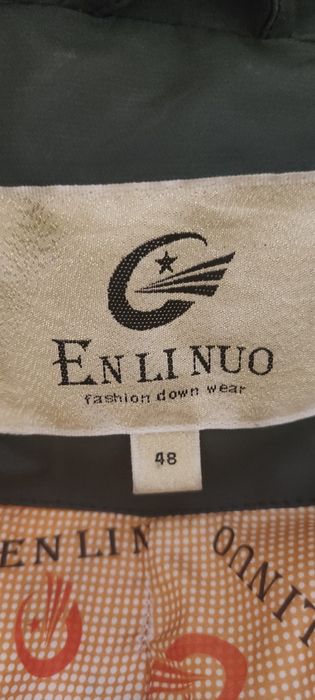 Продам женский пуховик