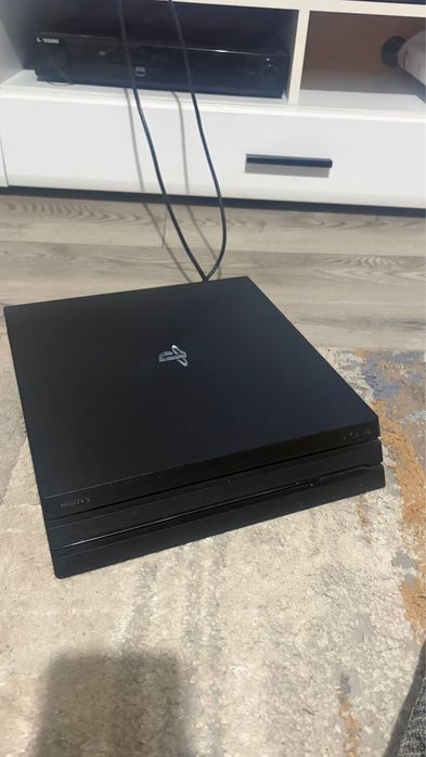 Ps4 pro 1 tb un controller si  joc far cry 4 limited edition