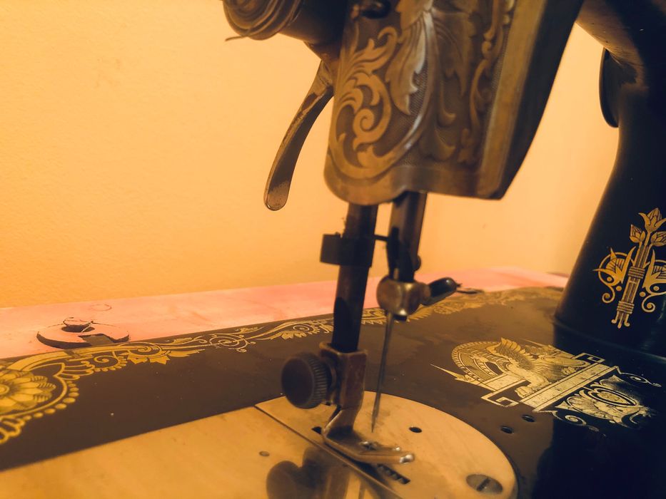 Крачна шевна машина Singer