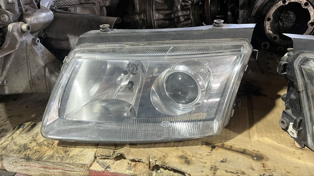 Оригинальные фары Пассат б5