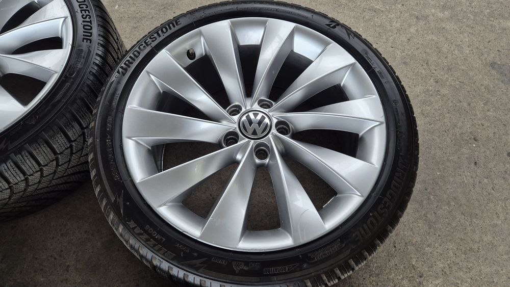 VW 18 цола 5x112 8J ET41 ц.о.57.1  със зимни гуми 235 40 18 Bridgeston