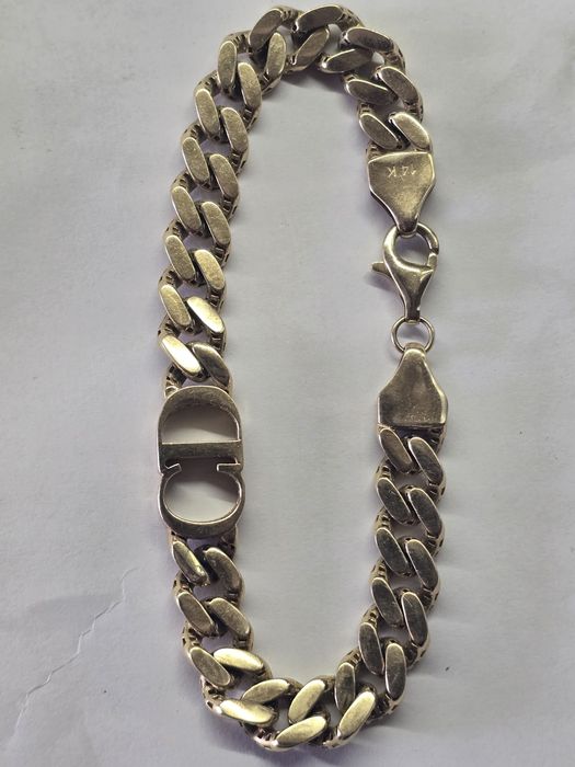 Золотой женский браслет.