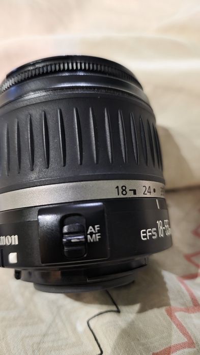 Объектив Canon вспышка Nikon