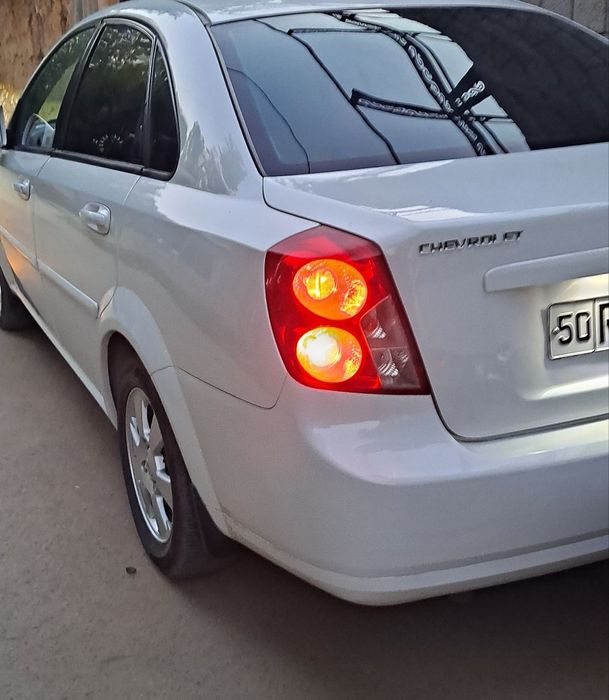 Lacetti  Gentra qilingan Oq