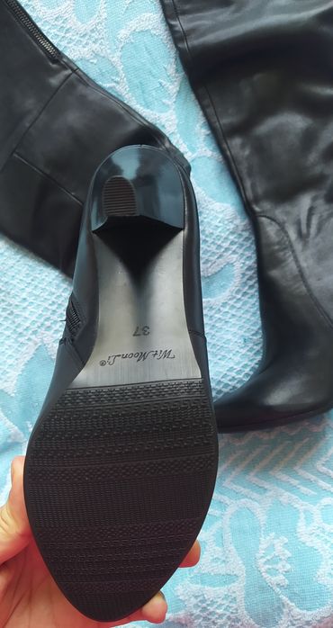 Продам кожаные сапоги