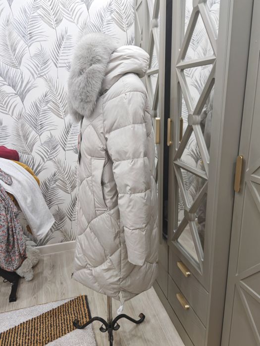 Продам Пуховик новая