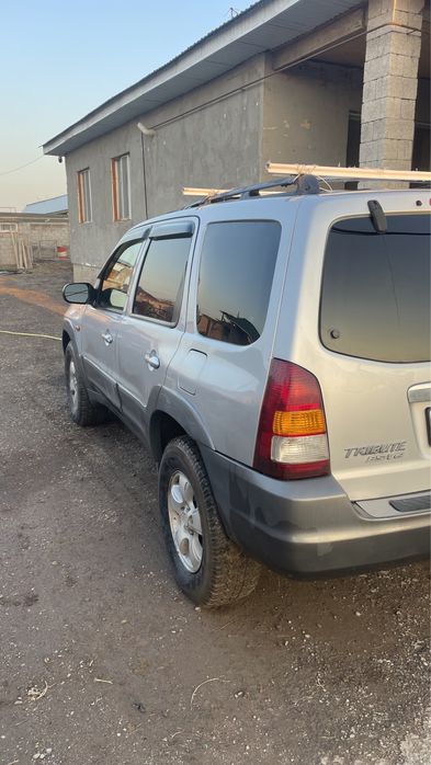 Мазда трибьют 3 литра