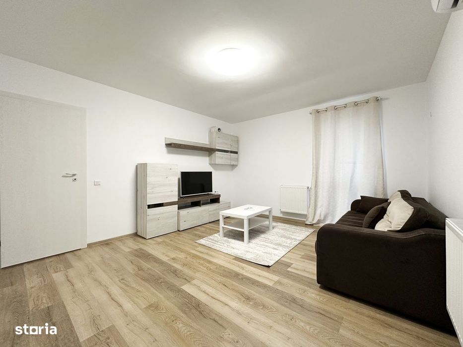 Apartament intr-un bloc retras, cu centrala si parcare — fotografia 3