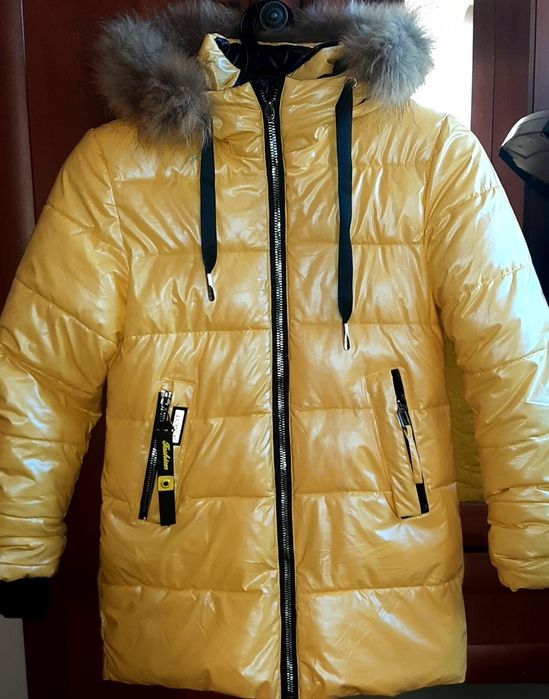 Продам  пуховик для девочек