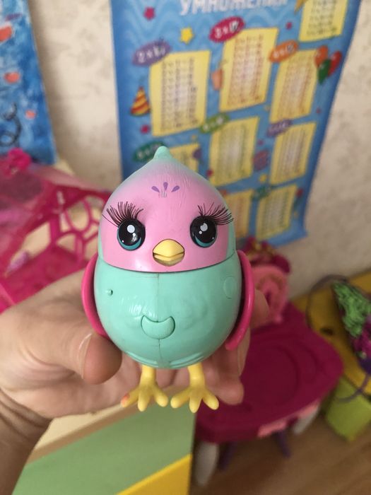 Продам игрушку птичка в клетке