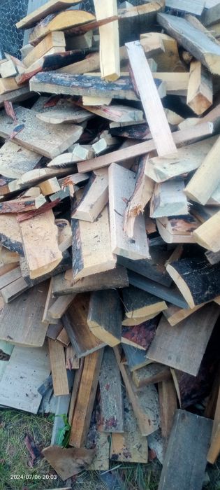 Дрова, в мешках.