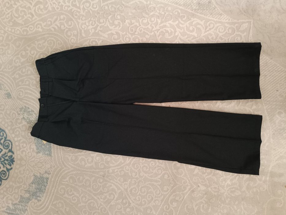 Продам брюки новые