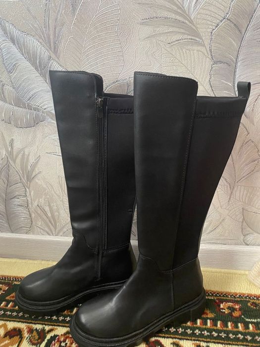 Длинные сапоги новый