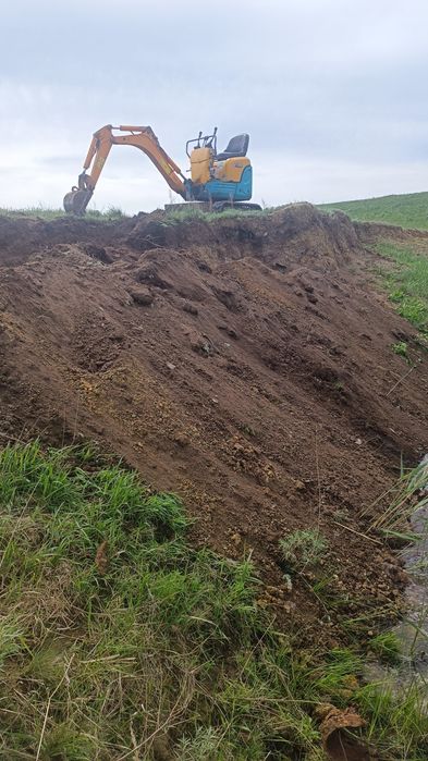 Услуги миниэксковатора