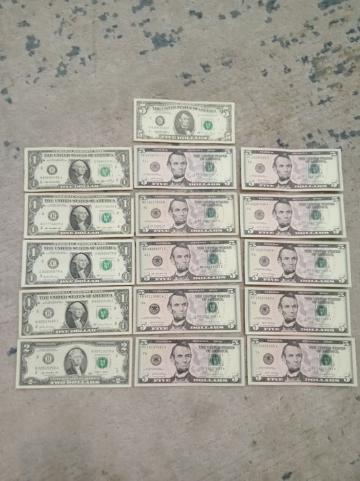 Купюра и монета и доллар