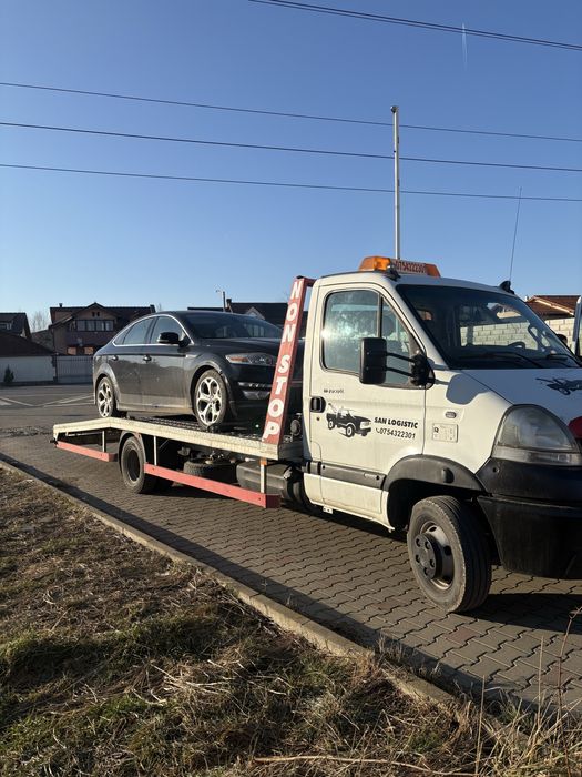 Tractări auto , transport utilaje