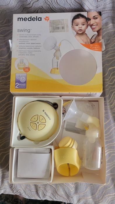 Продам электрический молокоотсос