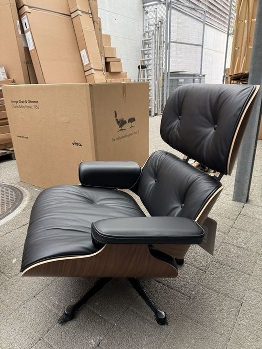 Fotoliu și otoman Vitra Eames 2025