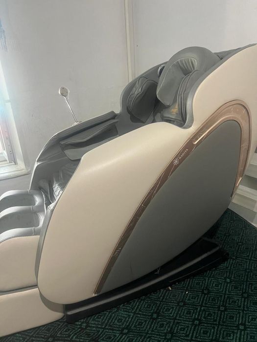 Массажный кресло