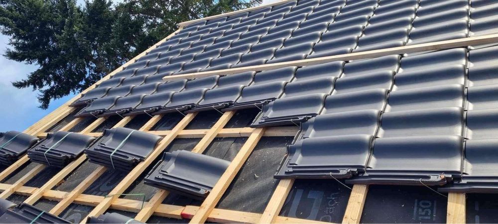 Tomi Bau oferte pt acoperisul tau