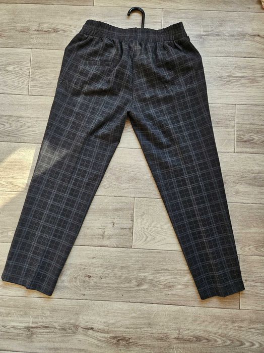 Женские брюки в клеточку