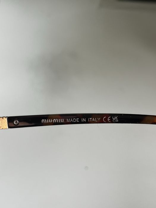 MIU MIU очила MU04ZS