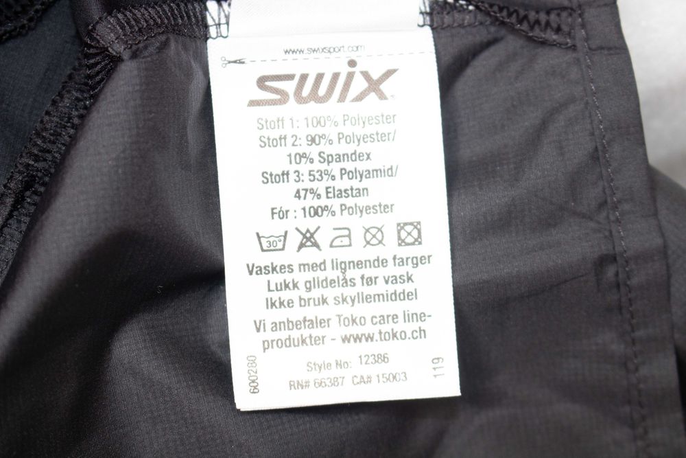Swix оригинално дамско яке черно кроп ултра леко ветровка за бягане М ново