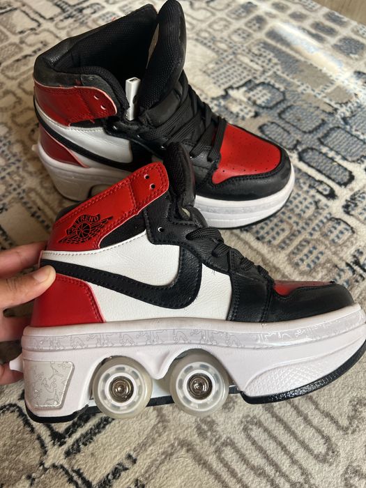 Роликовые  кроссовки 34 размера