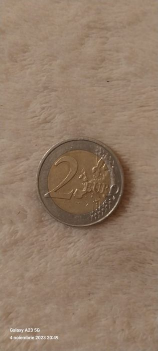 Moneda 2 euro cu defecte