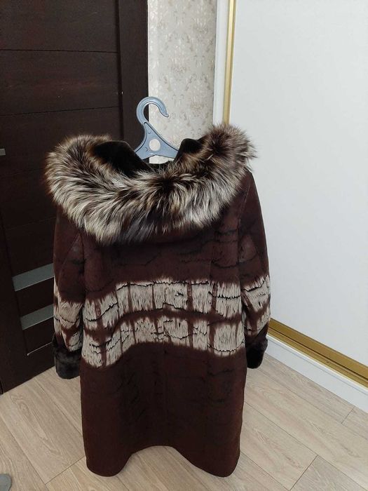 Новая дубленка с этикеткой