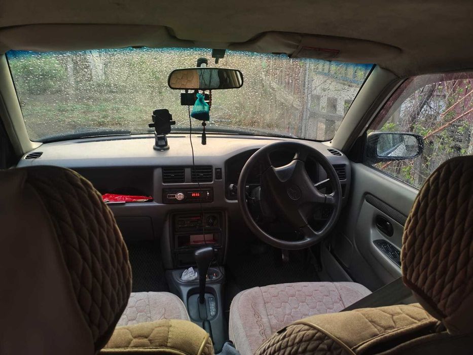 mazda demio 1998