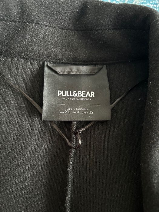 Черно изчистено палто