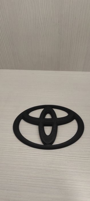 Эмблема на Toyota
