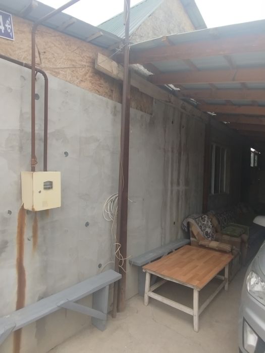 Два дома в одном участке