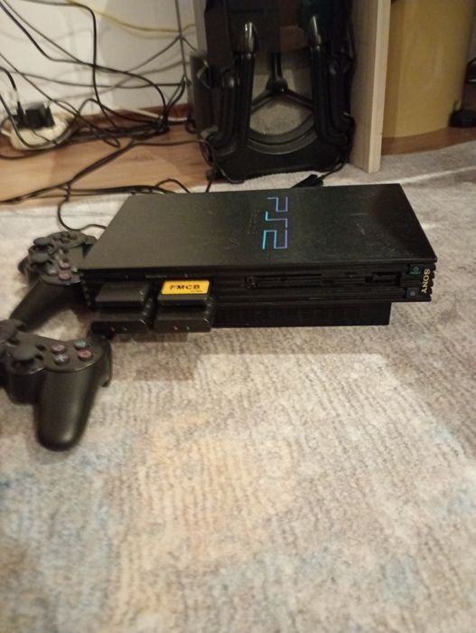 PlayStation 2 gata modat refurbished  aprox 30 jocuri la alegere