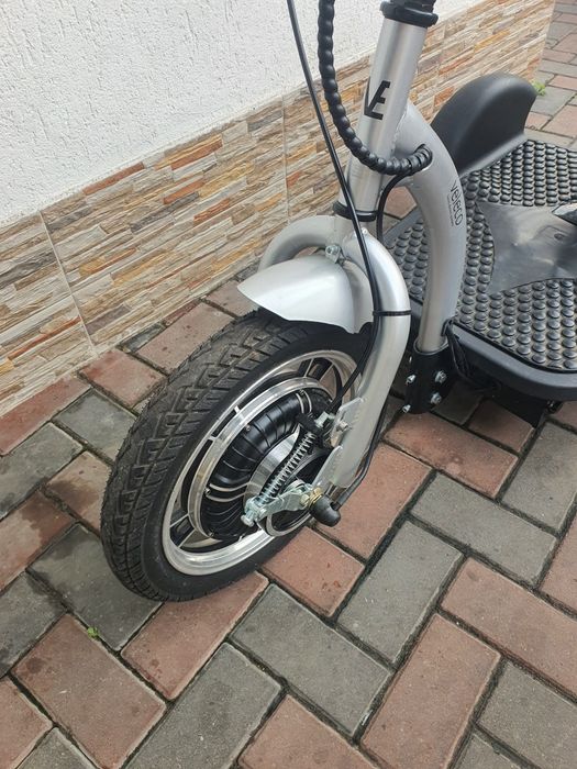Triciclu electric aproape nou imp germania