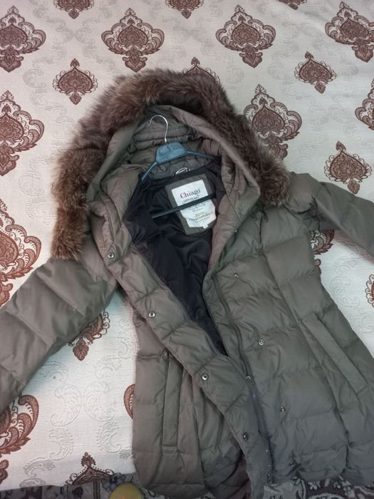 Пуховик в отличном состоянии.
