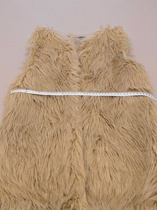 Vesta din blana eco -> Poema