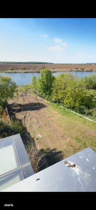 Teren intravilan 2.300 mp cu deschidere la lac, Ciofliceni