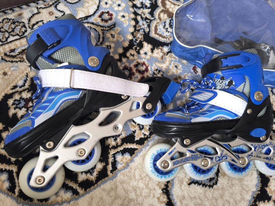 Роликовые коньки