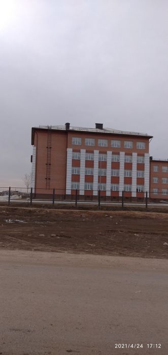 Участок с недостроенным домом в Коянды