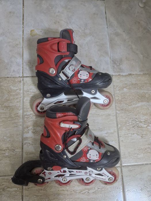 Роликовые коньки