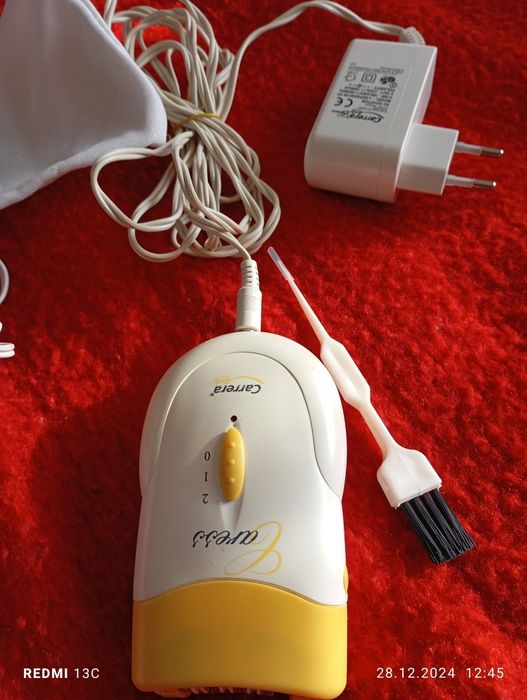 Epilator Braun  si Carerra